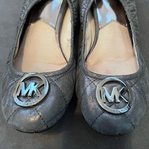 Michael Kors gunmetal quilted flats.
